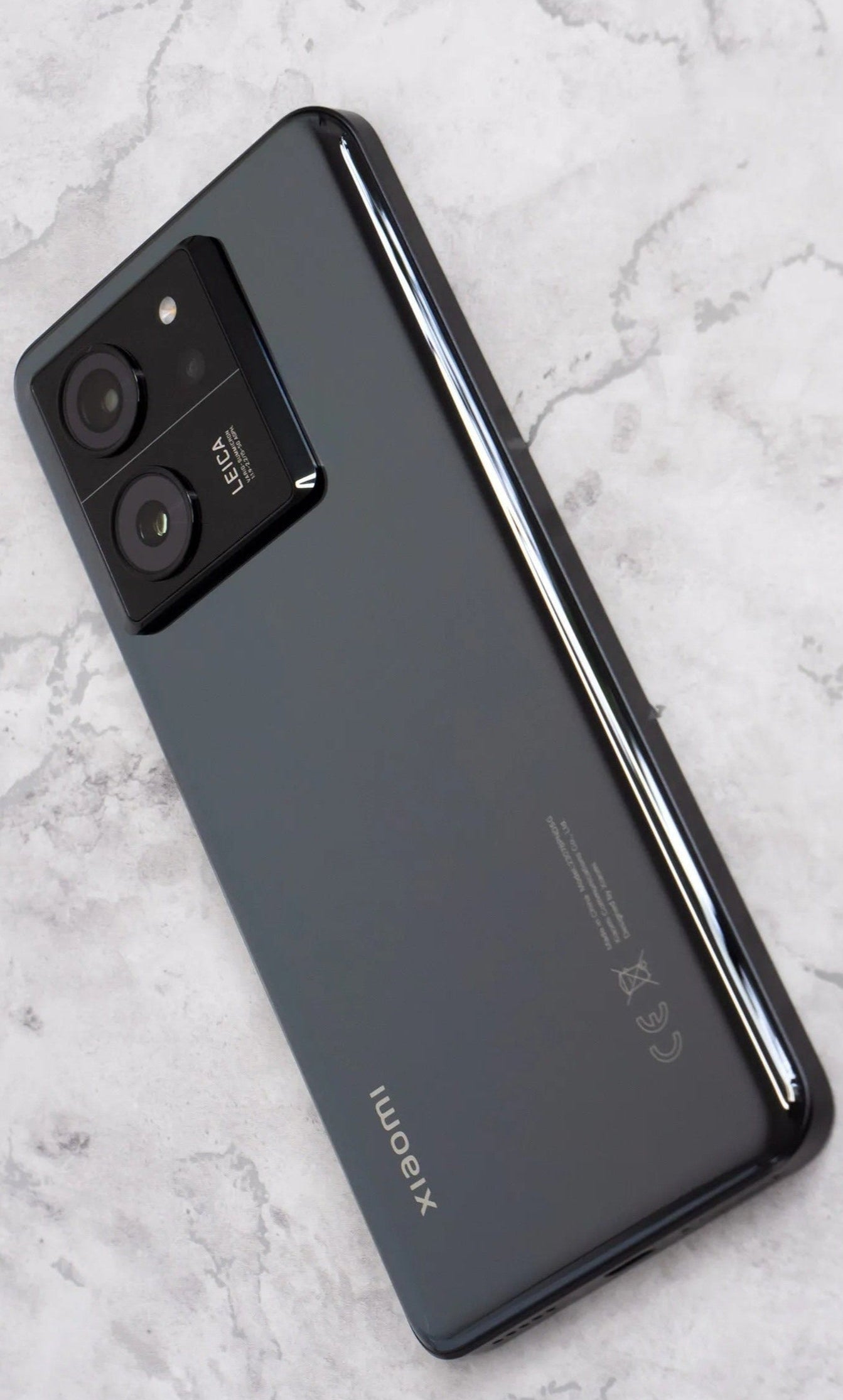 Xiaomi smartphone with Leica branding on a marble surface